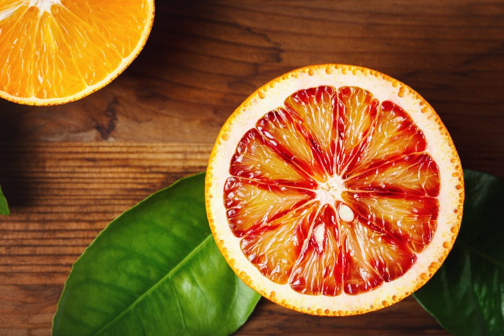 Half of blood orange and orange 