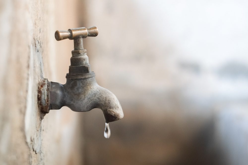Drops of water from the old faucet.